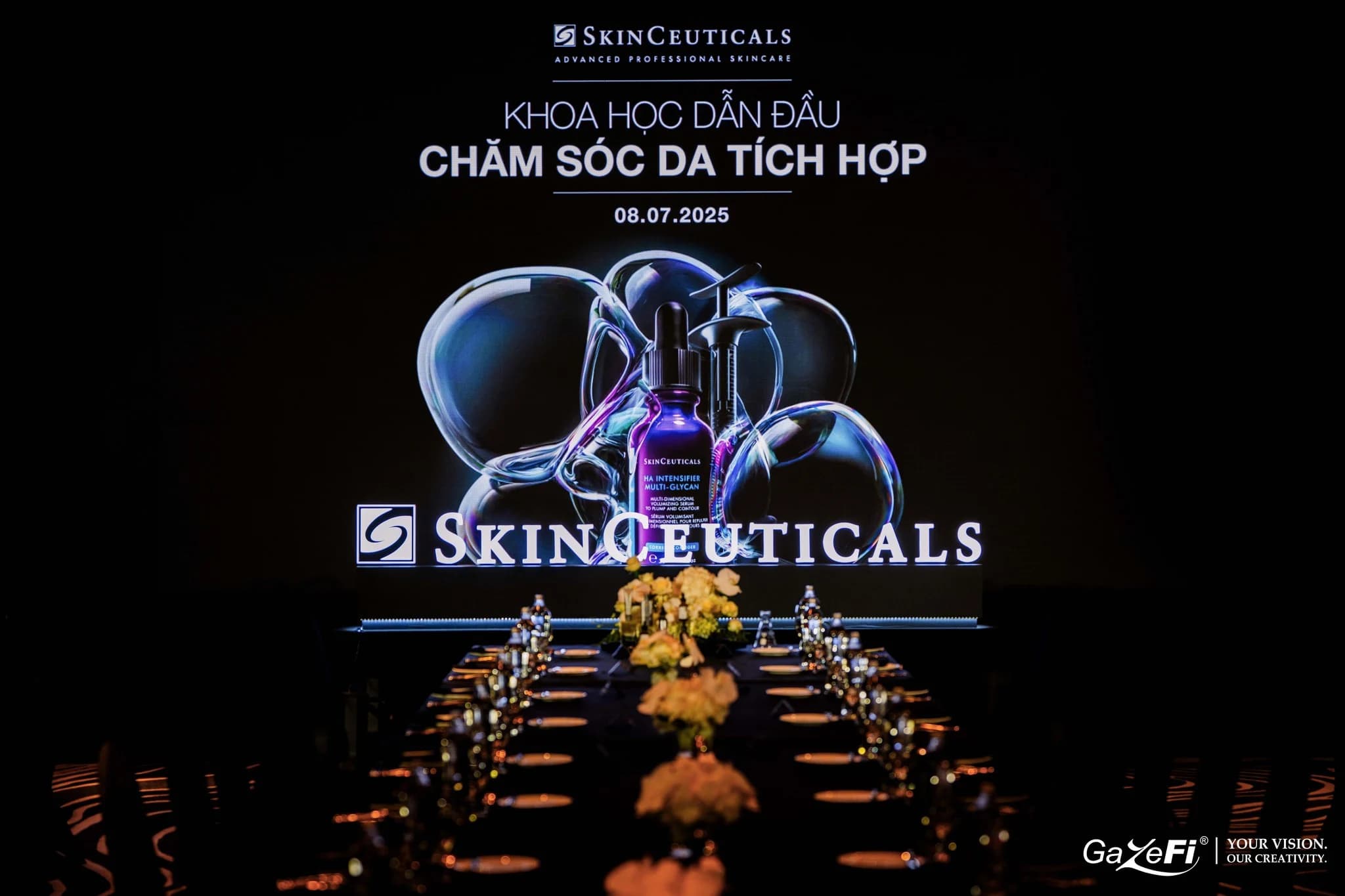 Corporate summit and keynote stage production with panoramic LED and theatrical lighting